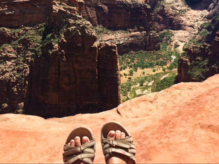 View of the feet resting at the Angels Landing in Zion National Park