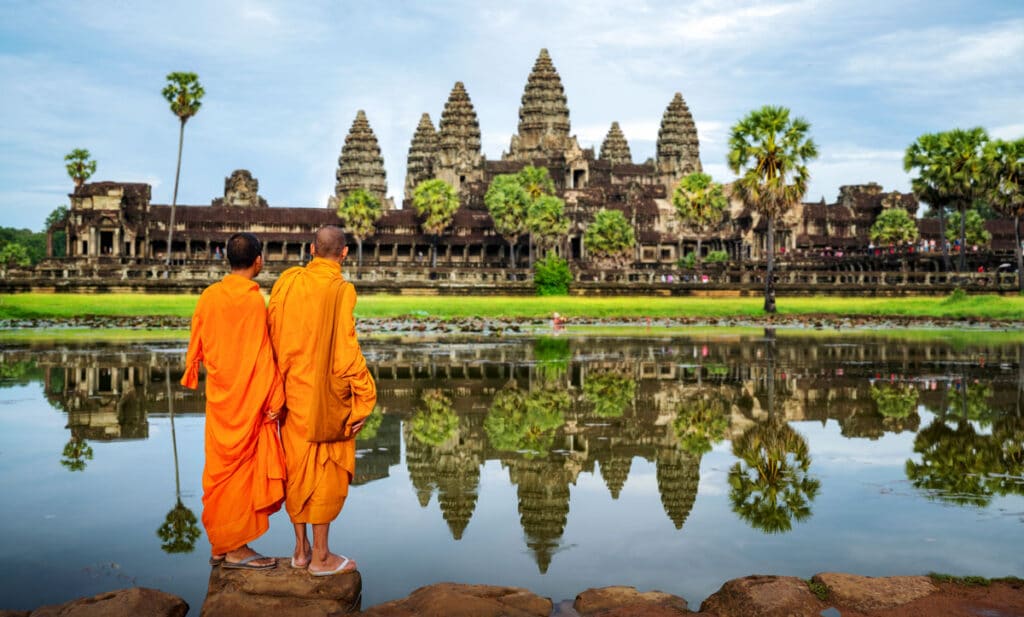 Asian Monks looking at the Angkor Wat in Cambodia