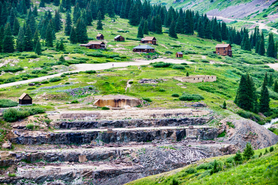 The ghost town of Animas Forks with rocky terraces along the Alpine Loop in Colorado