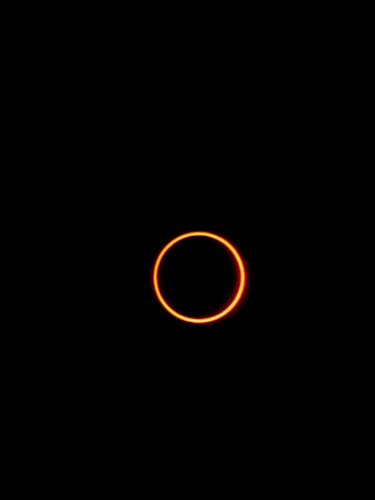The moon passes between the earth and the sun