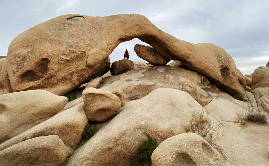 The author under the Arch Rock in Joshua Tree