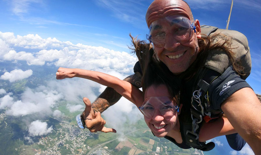 View of the author and a man enjoying their skydiving experience