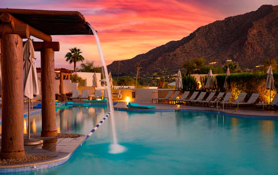 A resort in Arizona with pool during sunset