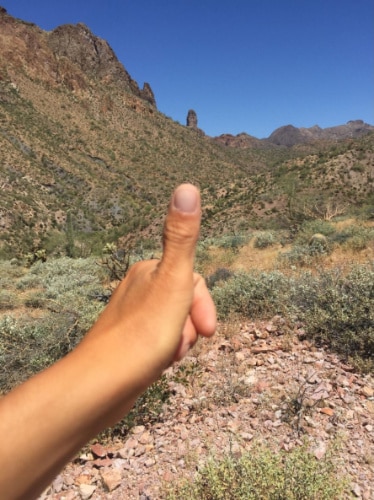 The author's hand giving a thumbs up at Arizona Trail in Kearny
