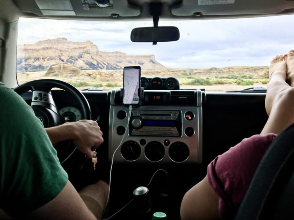 A couple driving around the scenic views of Arizona seen from the car