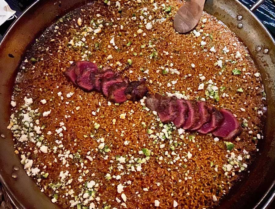 A large pan of paella with Iberian pork in Arros QD London