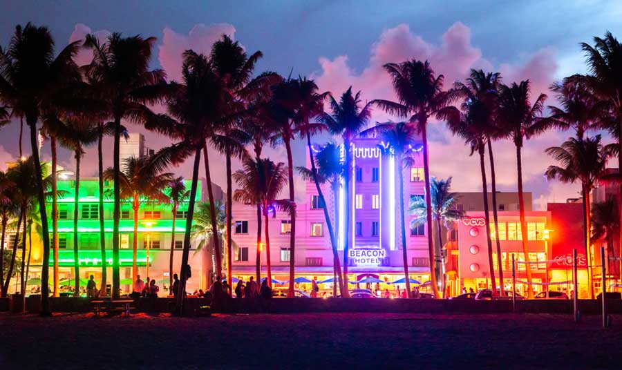 The Art Deco Buildings illuminated with neon lights at night
