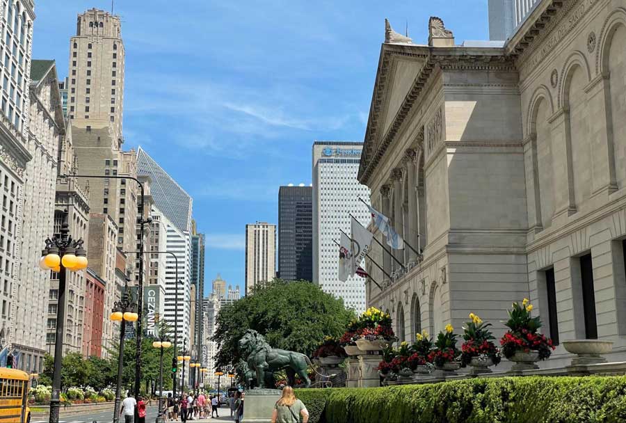 People passing by the building of The Art Institute of Chicago