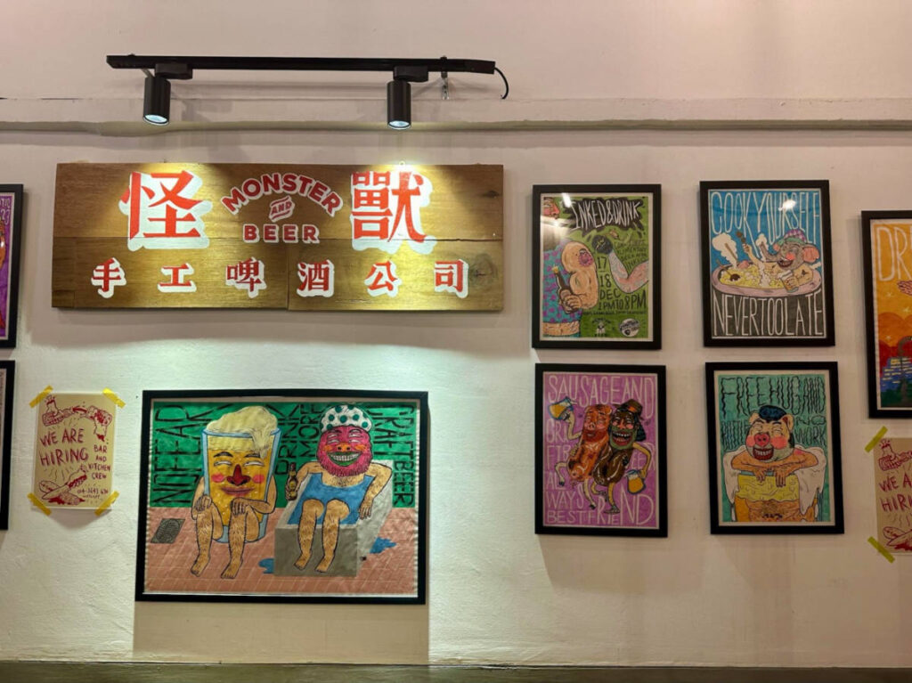 Art and signage on display at Monster and Beer