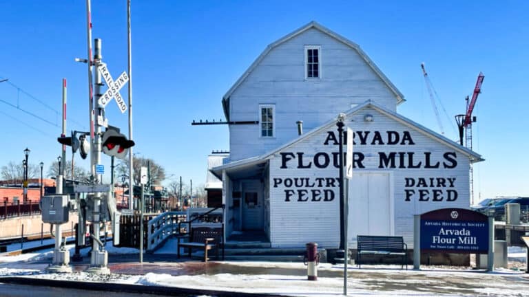 Façade of the Arvada Flour Mills near the railroad crossing