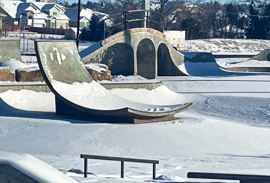 View of the snow covered Arvada Skatepark in winter