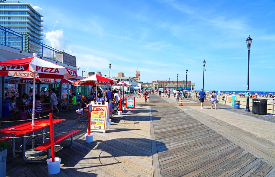 View of people and shops along the Asbury Park Beach Boardwalk