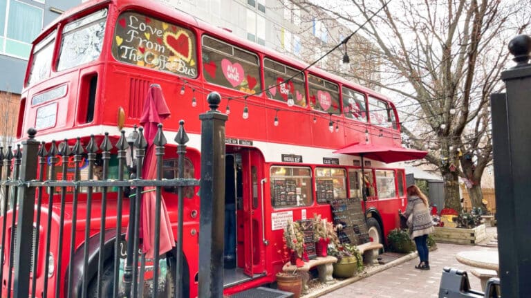 Exterior view of a red double-decker bus of Double D’s Coffee & Desserts, one of the best coffee shops in Asheville North Carolina