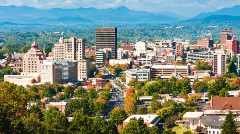 Aerial view of Asheville skyline in autumn