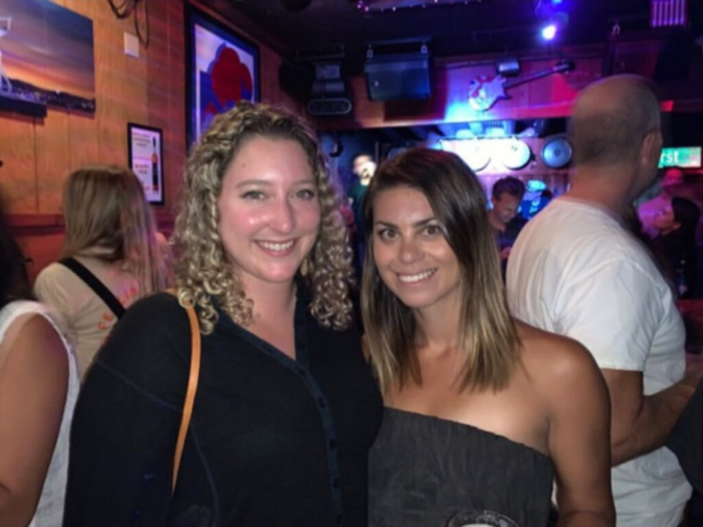 Author Jess Levy and her friend enjoying live music at 1st Street Bar