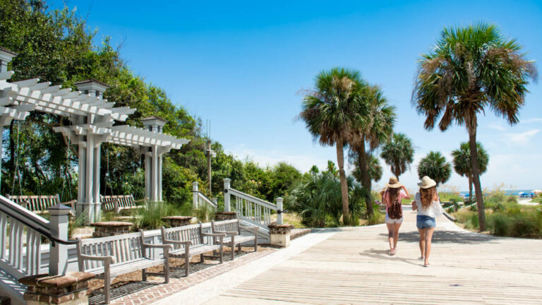 Friends walking to the beach on summer trip at Coligny Beach Park