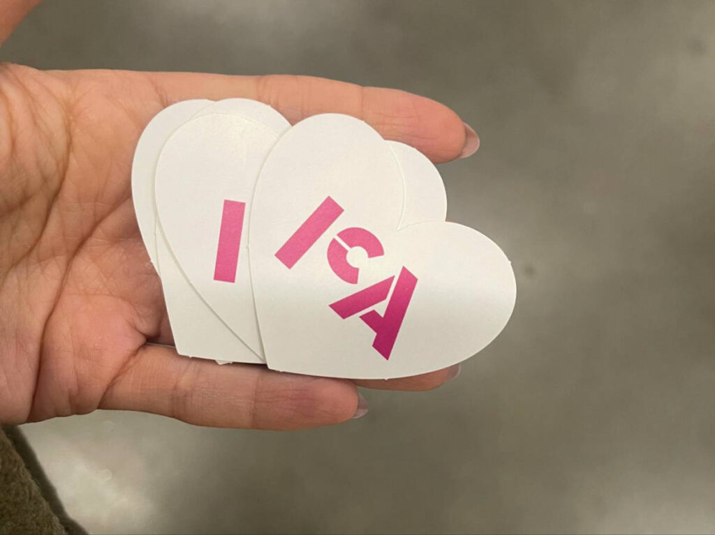 ICA logo on a paper heart