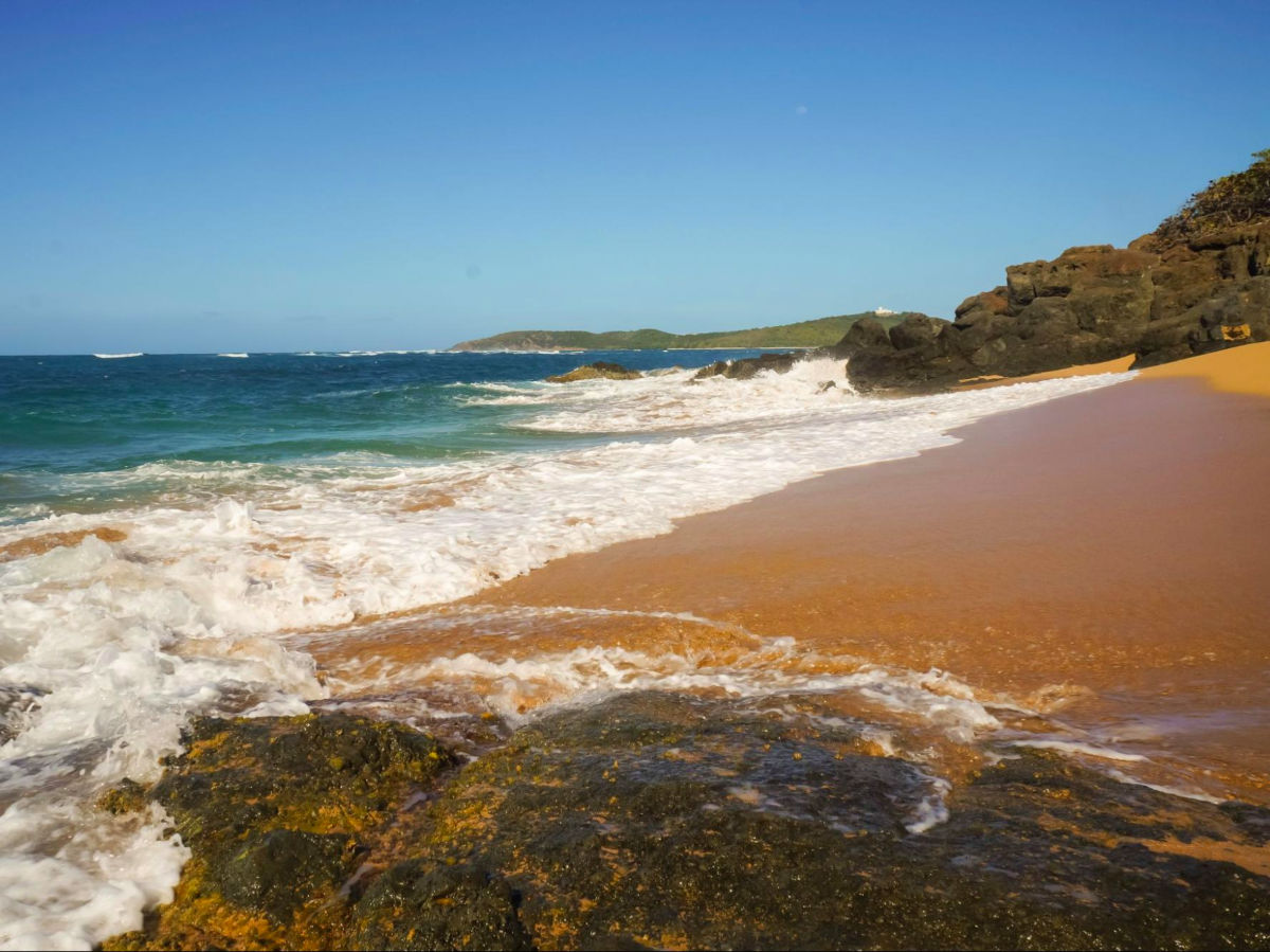 View of the reddish sand of Playa Colorá