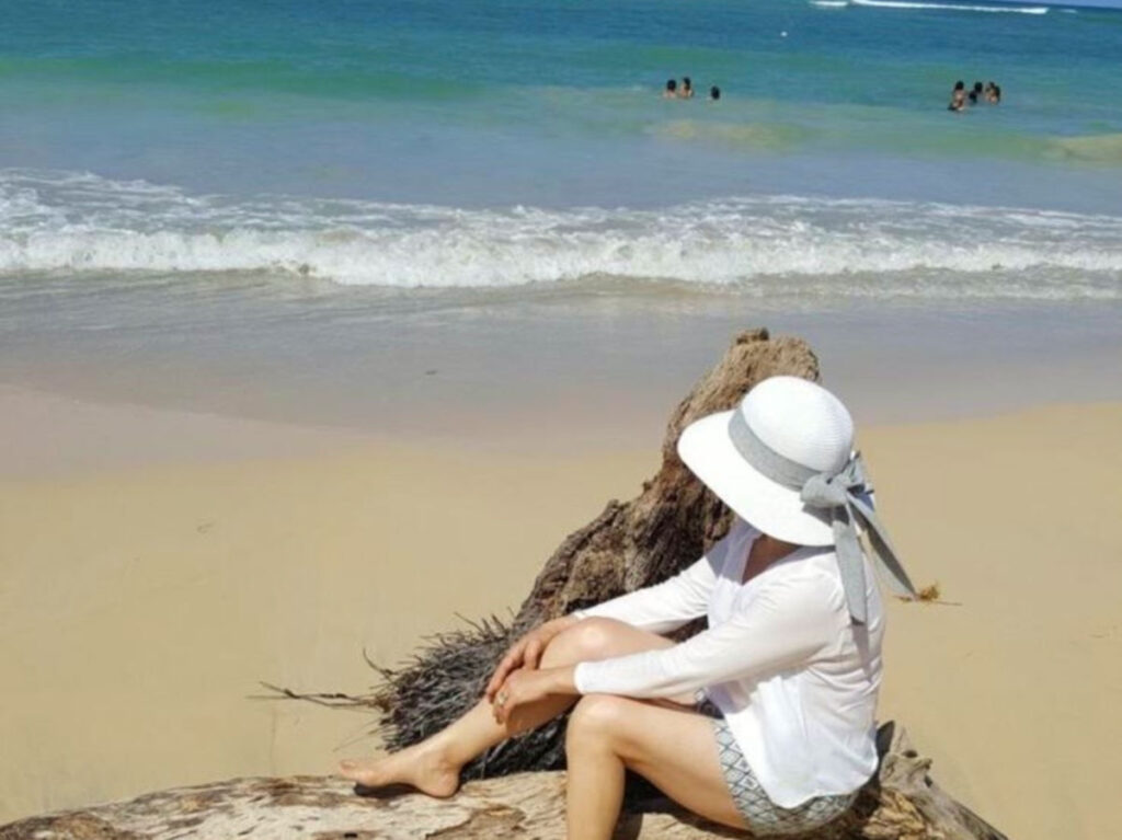 A person looking at the view at Playa Macao