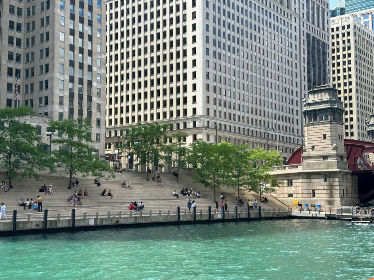 People resting on the stairs at The Chicago Riverwalk