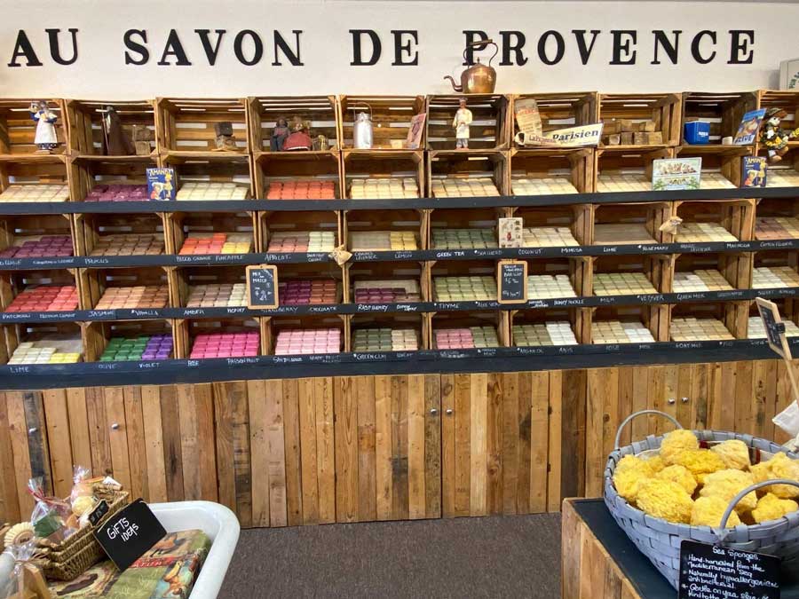 Different kind of handmade soaps displayed inside Au Savon de Provence