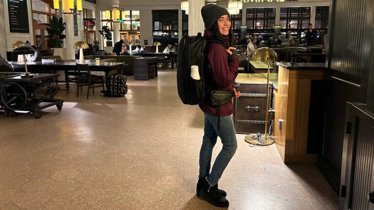 Author Abigail carrying her Travel Backpack in Denver Union Station