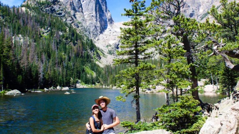 The author, Abigail Bliss, and her husband posing at Dream Lake in Rocky Mountain National Park