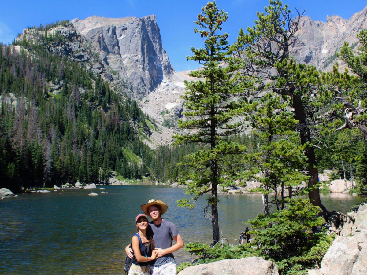 Author Abigail and her husband posing for a photo on the trail to Emerald Lake