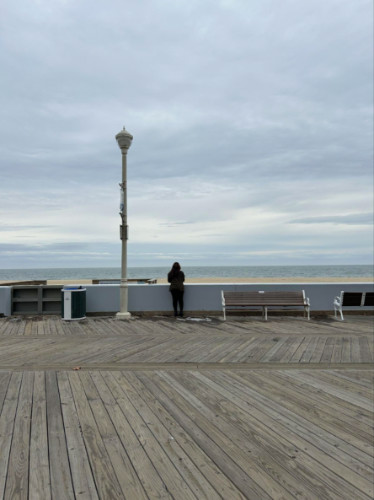Author Alexandria looking out at the beach