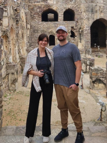 Author Betty standing at a tourist site in India