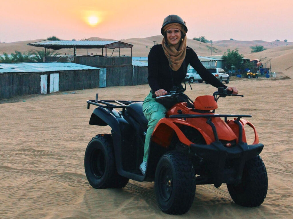Author Betty riding an ATV