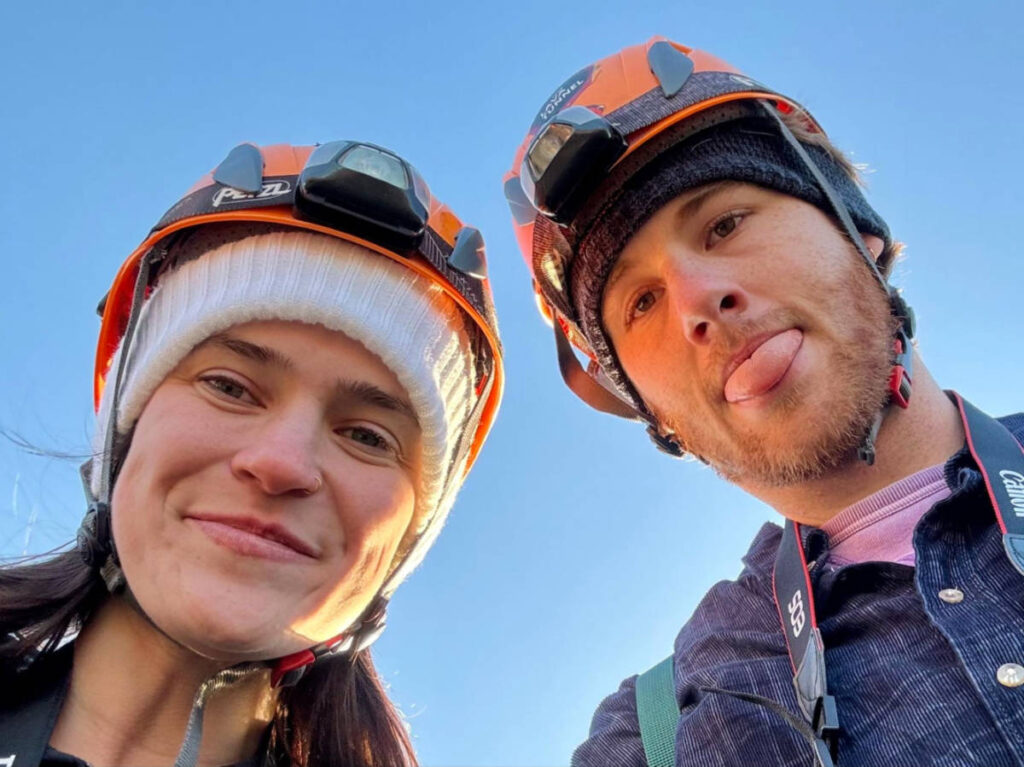 Author Betty and her boyfriend wearing a headlamp