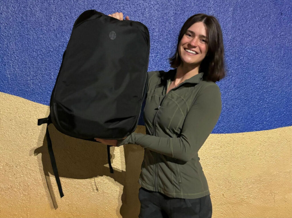 Author Betty carrying a Tortuga backpack