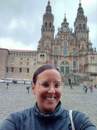 Author Catherine taking a selfie at Cathedral of Santiago de Compostela