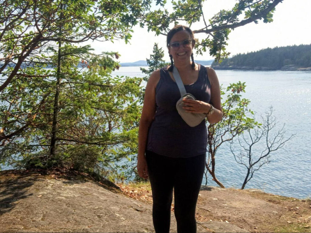 Author Catherine standing at Ruckle Provincial Park