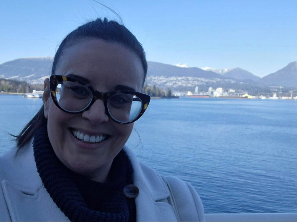 Author Catherine taking a selfie at Vancouver’s waterfront