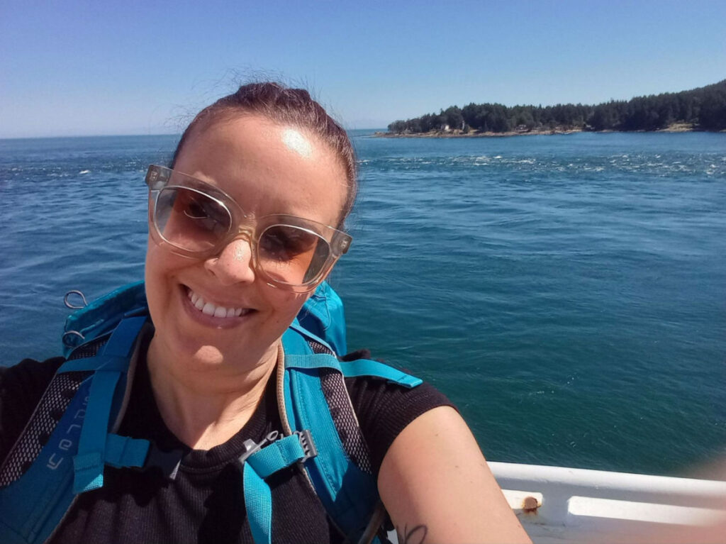 Author Catherine taking a selfie on a ferry to Salt Spring Island