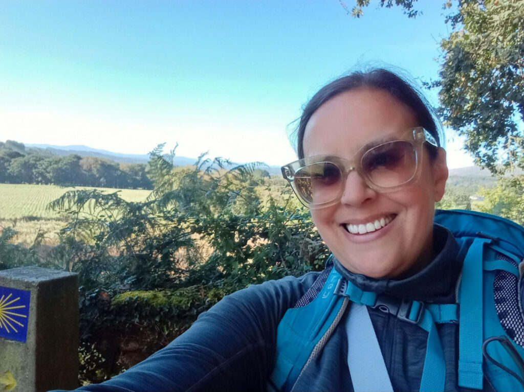 Author Catherine selfie at Camino Primitivo during a sunny day