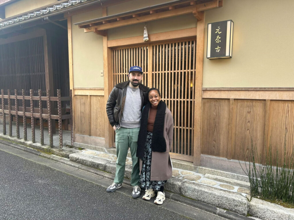 Author Chelsea and her husband in front of the Ryokan