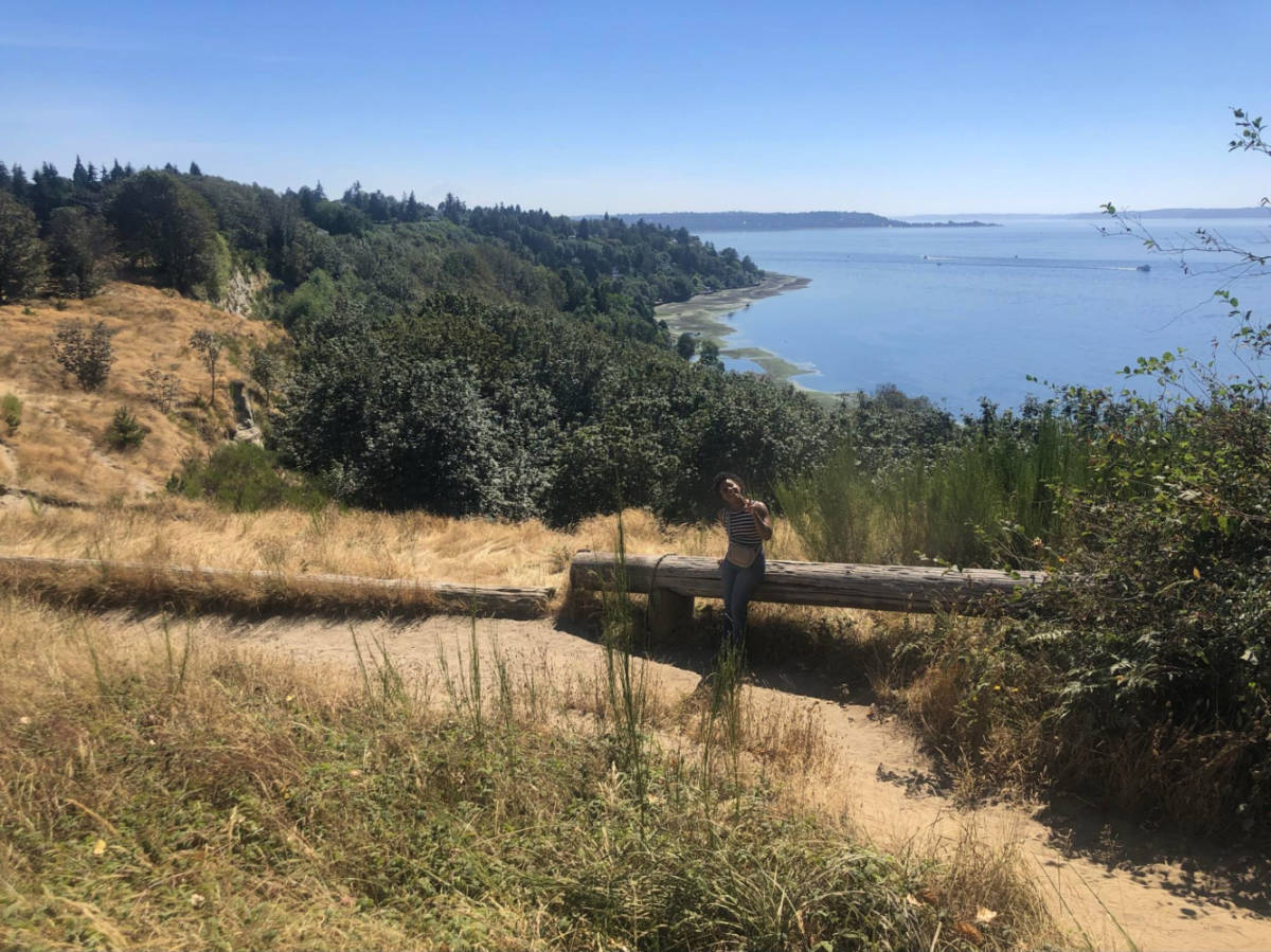 Author Chelsea posing at one of her favorite parts of the Bluff Trail