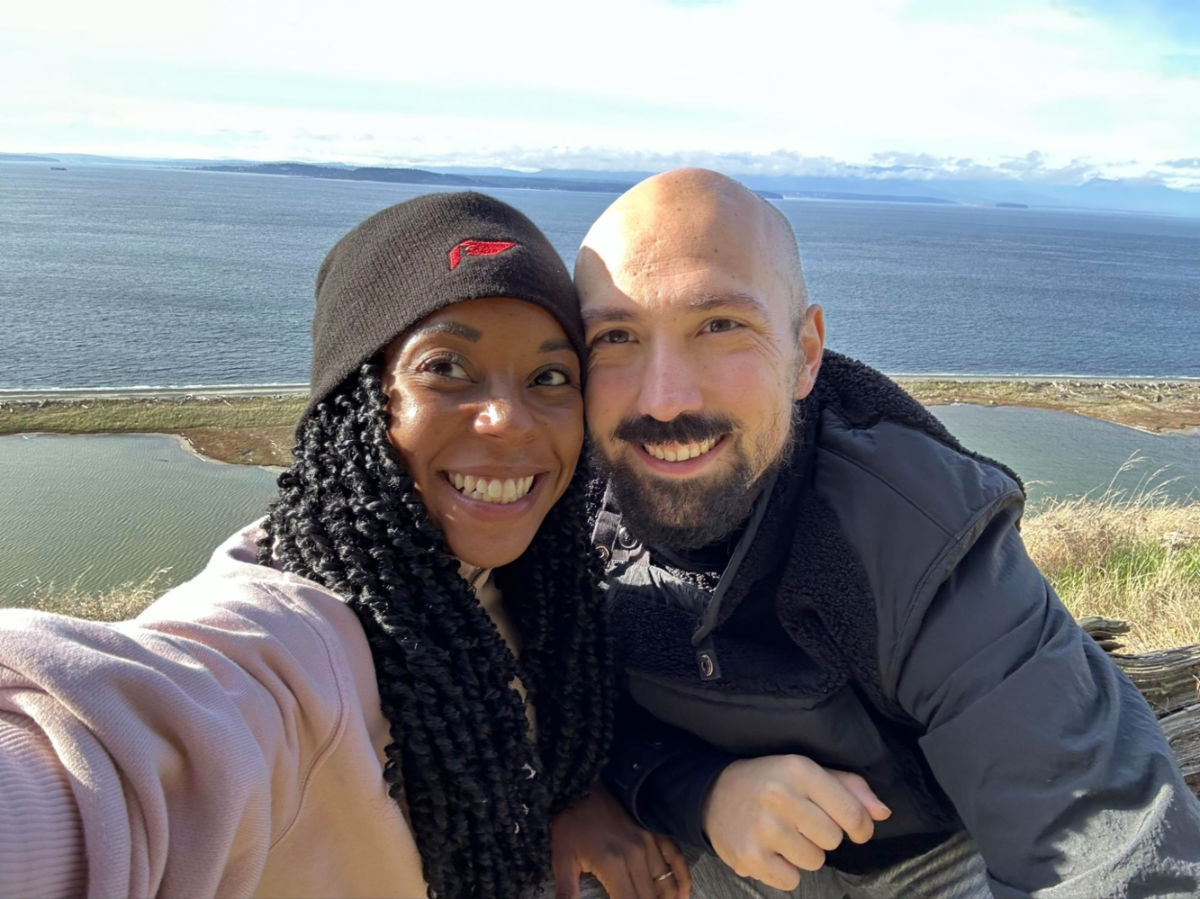 Author Chelsea and her husband taking a selfie at Ebey’s Landing Bluff trail