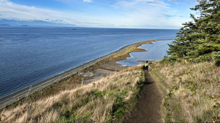 The author Chelsea Booker, hiking at the Ebey’s Landing bluff