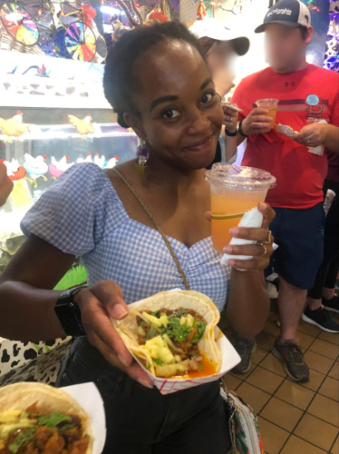 Author Chelsea showing her ordered food and drinks