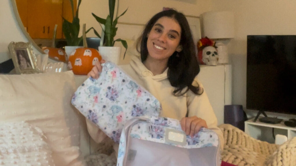 Author Claudicet showing her packing cubes for travel