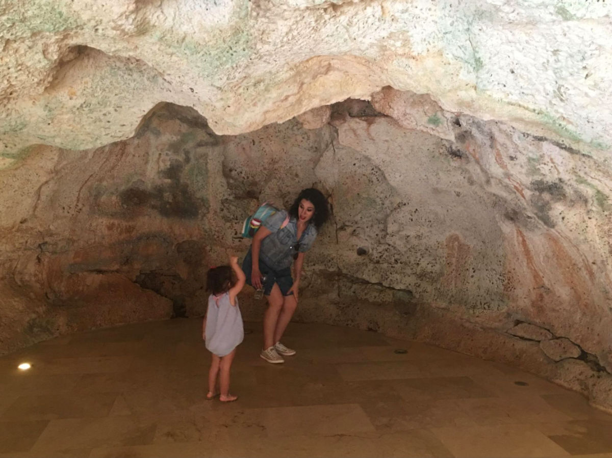 Author Claudicet and her daughter exploring Cueva de las Maravillas