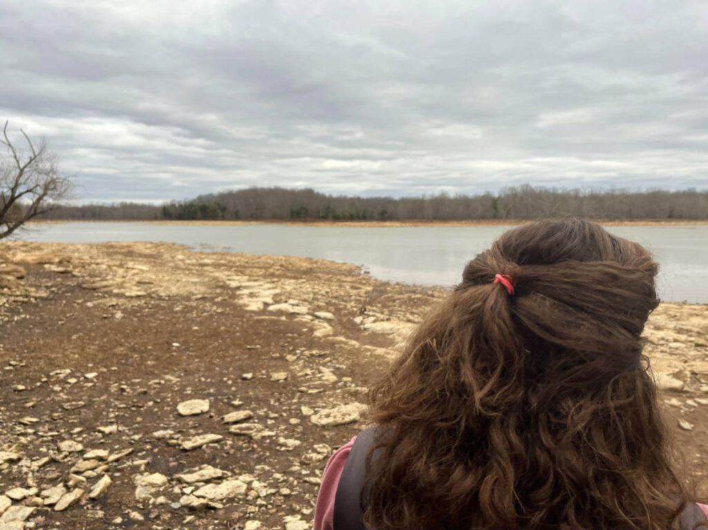 Author Elizabeth looking at the views at Long Hunter State Park