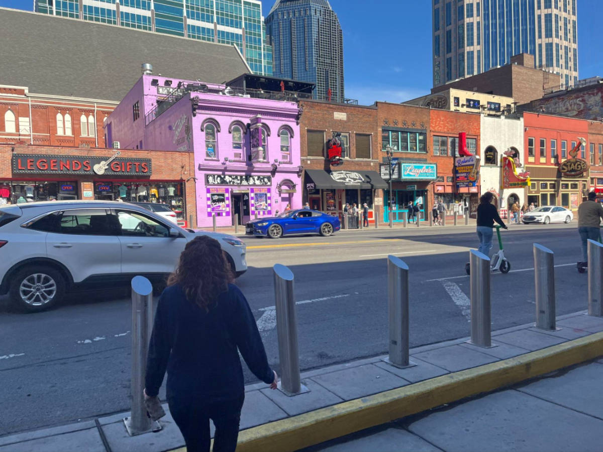 Author Elizabeth looking at the shops at the Honky Tonk Highway