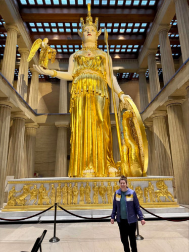 Author Elizabeth in front of the replica statue of Athena
