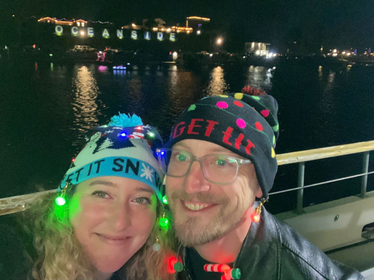 Author Jess and friend checking out the annual Parade of Lights