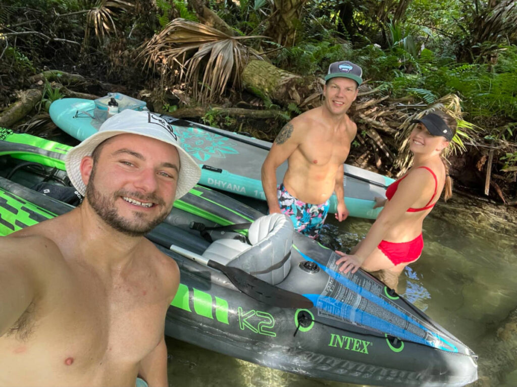 Author Katie and her friends taking a selfie with their kayaks